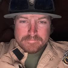 Who is good at cutting little boys hair in Sand Springs area?