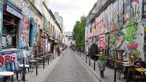 12 Hidden Treasures Of Paris Talk In French Street Art Paris Belleville Paris Paris Place