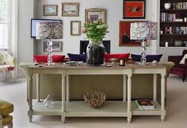 Place a console table behind the sofa. How And Why To Use Console Tables One Kings Lane Our Style Blog