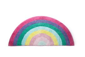 Create a colorful event with a rainbow aisle runner with shades of red, orange, yellow, green, blue, and purple carpet. Rainbow Shaped Rug