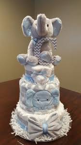 Here is a wonderfully easy baby shower favor to make. Baby Boy Elephant Diaper Cake Baby Shower Gift Centerpiece Check Out My Facebook Page Simply Shower Baby Boy Diapers Baby Diaper Cake Boy Baby Shower Gifts