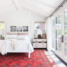If that isn't feasible, position it as far away from the door as possible—you want to avoid having your headboard on the same wall as the door. 10 Feng Shui Bedroom Ideas To Bring The Good Vibes Home