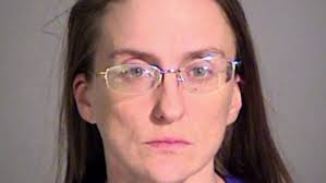 Woman arrested, accused of mail theft and fraud