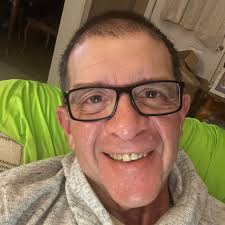 When should a child with X-linked Retinitis Pigmentosa start using a cane?