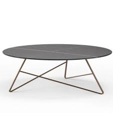 The tempered glass top floats above the boomerang shaped legs. Ermione Large Glass Coffee Table By Meme Design In Coffee Tables