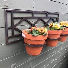 A wide variety of iron pot holders options are available to you, such as plastic type, ceramic type, and plant fiber type. Flower Pot Holder Wall Mounted Part Of The Rustic Merchant S Range Of Rustic Candle Holders