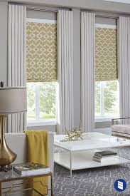 Yellow bedroom features gray arched headboard with silver nailhead trim on queen bed dressed in white bedding and zigzag pillows next to a 3 drawer distressed nightstand topped with regina andrew keepsake lamp. Premium Roman Shades Blinds Com In 2021 Window Treatments Living Room Living Room Blinds Curtains With Blinds