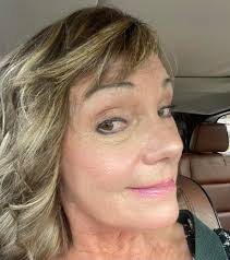 63. Was pretty blonde added more dark I feel better with some dark. Does it  age me?