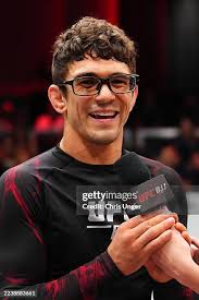 Andy Varela prepares to face Daniel Sathler in a 170-pound match... News  Photo