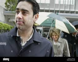Brent Rocha, left, murder victim Laci Peterson's brother and their mother Sharon  Rocha, holding the umbrella, returns to the San Mateo Superior County  Courthouse, in Redwood City, Calif., Thursday, Feb. 26, 2004,