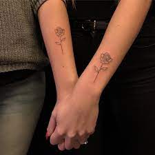 Beautiful Tattoo Idea For Best Friends Matching Outline Black Rose On The Arm Bff Tattoos Matching Bff Tattoos Tattoos For Daughters