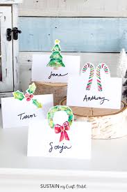 A beautiful ribbon and pearls christmas tree place card holder is a sophisticated idea for those who are looking for luxury. Free Printable Christmas Place Cards Sustain My Craft Habit