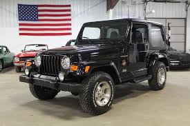 Image result for Brilliant Black 2002 Jeep