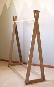 Kids' clothes rail is ideal for dresses and suits. Clothing Rack Children S Clothing Rack Wood Clothing Rack Children S Closet Kids Room A Frame C Wood Clothing Rack Diy Clothes Rack Wood Clothes