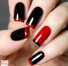 Glossy red roses on black nails look fiery! 45 Stylish Red And Black Nail Designs 2017