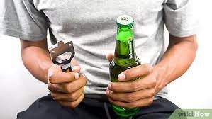 Place your hand over the bottle and put the underside of your ring finger under the cap. 4 Ways To Open A Beer Bottle Wikihow