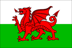 That would go some of the way towards explaining why the emblems of wales include a dragon, a vegetable, a spoon and a bird of prey. Welsh Flag Drag National Symbol Free Vector Graphic On Pixabay