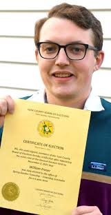 Spring Garden college student writes own name