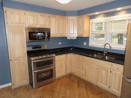 The backsplash is a matte white subway tile. Kitchen Design Ideas Kitchen Color Ideas With Light Wood Cabinets