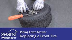 Install the tire back on the lawnmower. Replacing A Front Tire On A Riding Lawn Mower Youtube