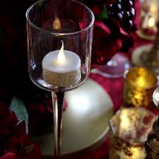 Designers have always had fun with candle holders, as these snappy little pieces demonstrate. Stemmed Tea Light Holders Set Of 3 Hire Dress It Yourself
