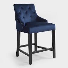 The Curvy Silhouette Of Our Counter Stool Brings To Mind The Everyday Glamor Of Mid Ce Velvet Dining Room Chairs Blue Velvet Dining Room Chairs Cheap Furniture