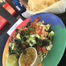 Grilled adobo chicken, black beans, charred corn, pico de gallo, guajillo sauce & crema. Blue Coast Burrito Pineapple Salsa Burrito Walls