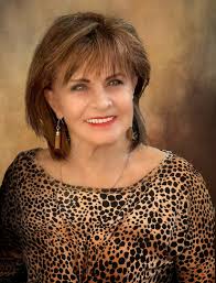 What does the Phantom of the Opera look like without his mask?