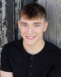 Dodger Grad by Newspaper