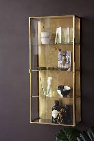 For smaller kitchen and condensed spaces where every inch matters, the wall mounted glass display cabinet with glass doors is the perfect choice for. Brass Glass Wall Mounted Display Cabinet Rockett St George Wall Mounted Display Cabinets Glass Wall Shelves Glass Cabinets Display