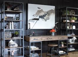An armoire neatly contains what you need to work at home―including corkboard to post important reminders. 19 Home Office Ideas That Will Make You Rethink Your Workspace Living Spaces