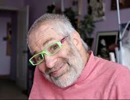 Neil Marcus in his Berkeley apartment, 2018. Photography by Mel Hofmann.  #disabilityawareness #disabilitysupport #disabled #inclusion  #TheBarriersWeFace #WheelchairLife #DisaBodyPosi #dystonia
