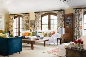 Wood Trim On Spanish Style Dome Windows And Colorful Curtains Hot House Flowers By Celerie Kemble Curtains Living Room Eclectic Living Room Family Living Rooms
