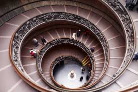 The two helixes span three floors, but the two spirals never meet. Bramante Staircase Vatican Museums