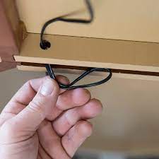 Install the under cabinet light fixtures. Between Upper Cabinets Hide The Wires For Under Cabinet Lighting Tips Assembling And Installing Ikea Kitchen Between Upper Cabinets Hide The Wires For Under C Cabinet Lighting Diy Kitchen Cabinet