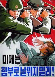 Workers pass propaganda posters as they cycle through hungnam fertilizer complex on february 04, 2019 in hamhung, north korea. North Korea S Bold Wave Of Propaganda Art In Pictures World News The Guardian