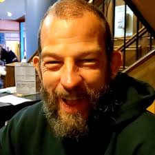 Abandoned black bicycle near Premier Inn