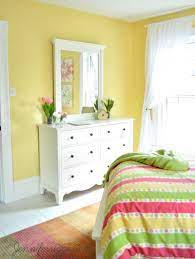 For a room painted in warm yellow, a soft beige bedding set doesn't detract from a pretty bedroom color scheme. Pin On Whitney S Room