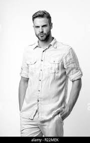 Serious glance. Guy bristle serious face posing confidently white  background. Appearance depends