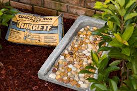 It looked like rain so i mixed by hand in plastic tubs on tarps. Easy Crafting Concrete Projects Amazing Planters Rain Diverter And More