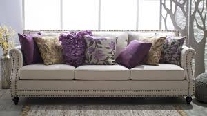 Great for drivers, office workers, travelers, or people with back pain. 5 Ways To Decorate A Neutral Sofa With Throw Pillows Hayneedle Cushions On Sofa Living Room Pillows Purple Sofa