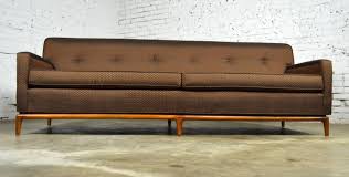Delivery was about 5 weeks and went smoothly; Mid Century Modern Tufted Tight Back Tuxedo Sofa On Walnut Base For Sale At 1stdibs