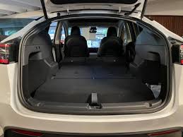 Additionally, a tesla video showing off the 7 seater has been published. The Rear Cargo Area In The 7 Seat Model Y Is Completely Flat Thanks To This Ingenious Design Trick Drive Tesla Canada