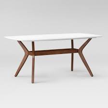 White finish of table top and natural wood color, full of sense of harmony. Make A Statement In The Dining Room With The Westbrook Mid Century Rectangle Midcentury Modern Dining Table Mid Century Dining Table White Dining Table Modern