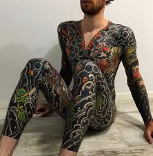 Often one likes to pause and enjoy the open ending or simply save up for the next step in the process. Japanese Bodysuit Tattoo By Koji Ichimaru Swipe To The Side To See All 3 Photos Japaneseink Japanesetatt Body Suit Tattoo Japanese Tattoo Full Body Tattoo