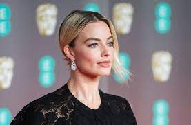 The jonas brothers step out in n.y.c., plus julia roberts, margot robbie & john cena and more. Margot Robbie S 2021 Oscars Look Included Brand New Bangs