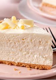 Fluffy White Chocolate Cheesecake A Filling Of Cream Cheese White Chocolate Flavor Pudding And Whipped Topping Desserts Cheesecake Recipes Fluffy Cheesecake