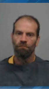 Man charged with assaulting wife, putting pills in family's food