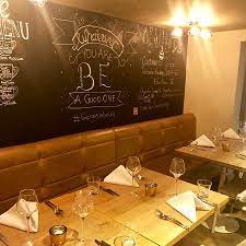 A chic bar, its packed with endearing design features, from a wooden clad wine bar, chalkboard menus and lanterns scattered about, to. Interior Picture Of George S Dining Room Bar Worsley Tripadvisor