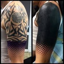 15 Striking Blackout Tattoos That Almost Look Unreal Blackout Tattoo Cover Tattoo Black Tattoo Cover Up